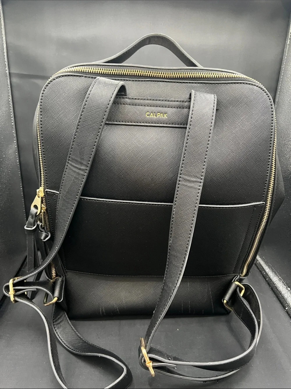 Calpak Black Faux Leather Backpack with Gold Hardware
